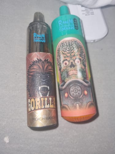 Customer's two RAndM Tornado 9000 vapes, one showing the Peach Mango flavor with a gorilla graphic.