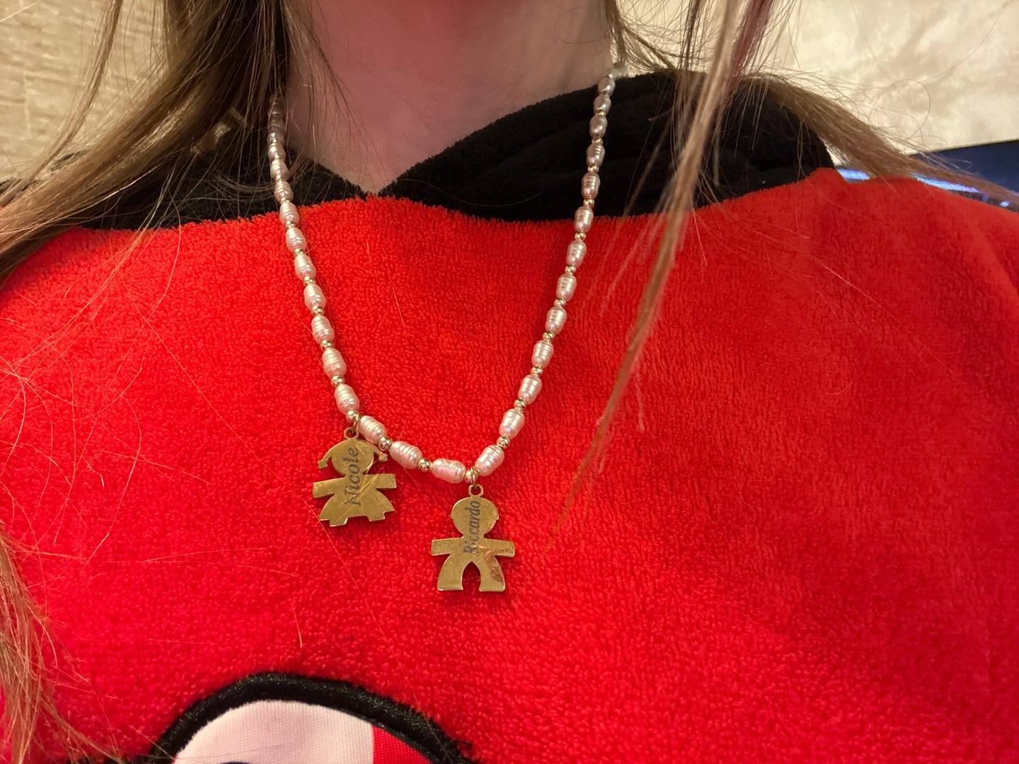 Customer photo review of Girocollo perline con bambini e incisione