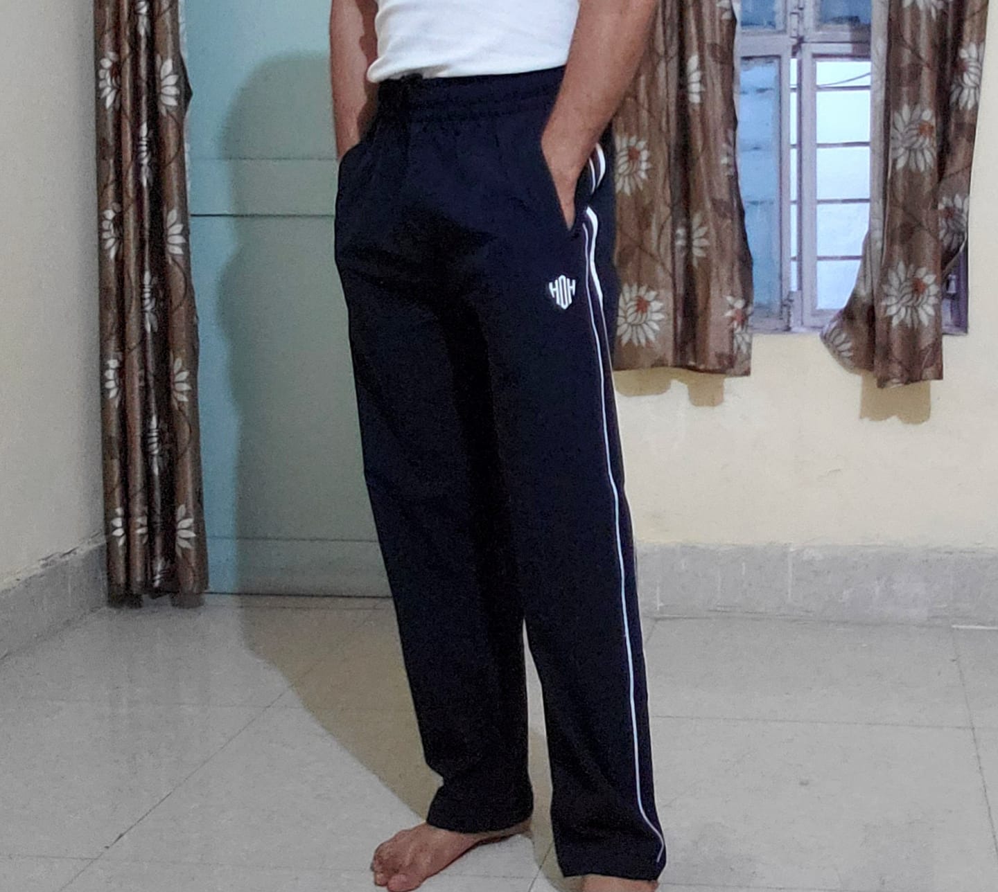 Customer photo review of StrideX Loose Fit Track Pants (Cannoli Cream)