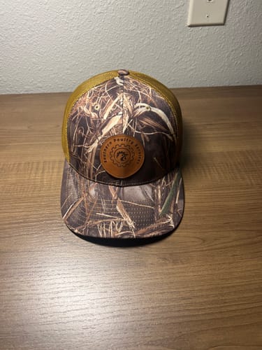 Customer photo review of Custom Leather Patch Trucker Hat - Richardson 112P
