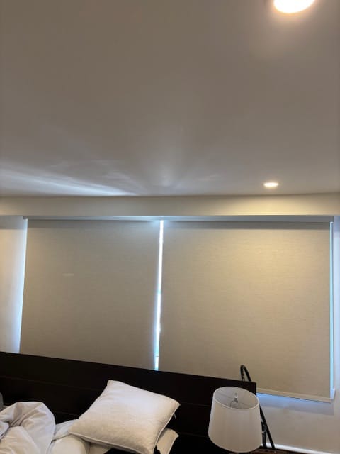 Customer photo review of SmartWings Motorized Roller Shades 100% Blackout Linen