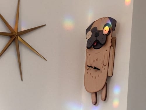 Customer photo review of Penny the Pug Pendulum Clock
