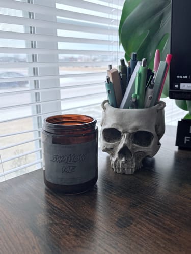 Customer photo review of Swallow Me | Book Themed Candle
