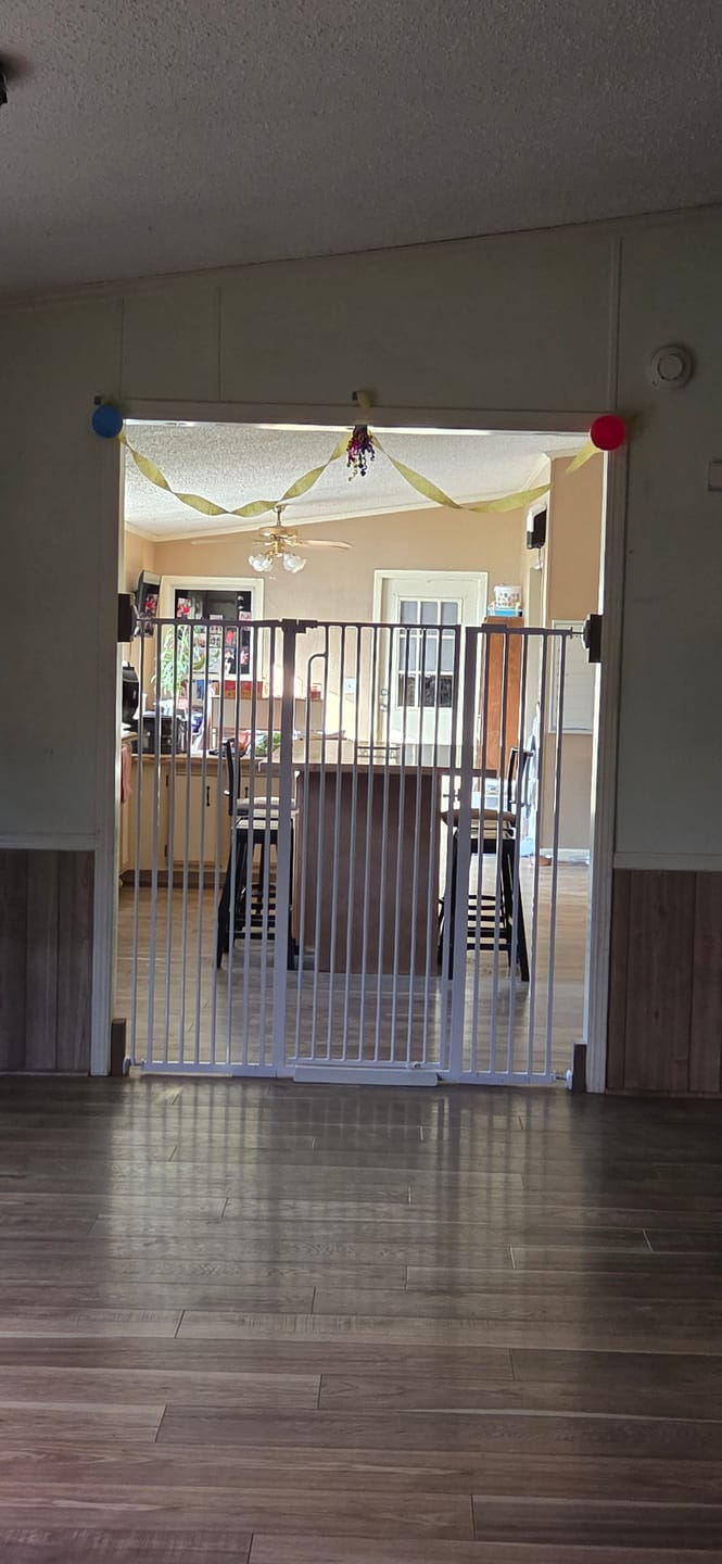 Customer photo review of FairyBaby 57" Extra Tall Pet Gate for  Big Dogs and Curious Climbers