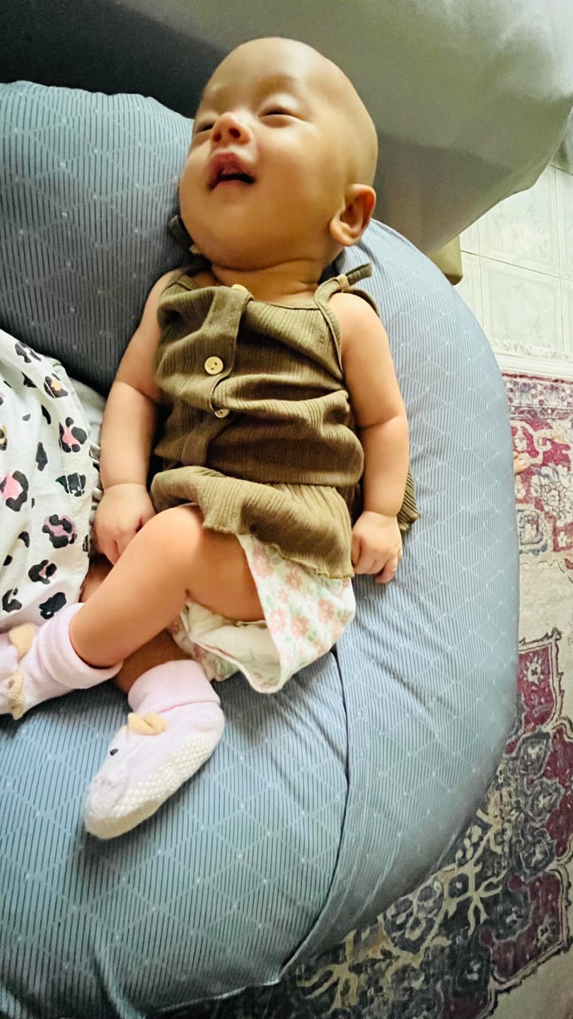 Customer photo review of Crescent Pillow | Breastfeeding & Baby Sitting Support