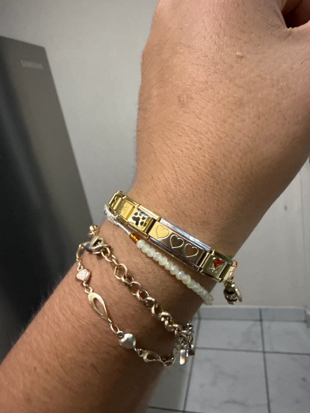 Customer photo review of Charm Doble Corazones