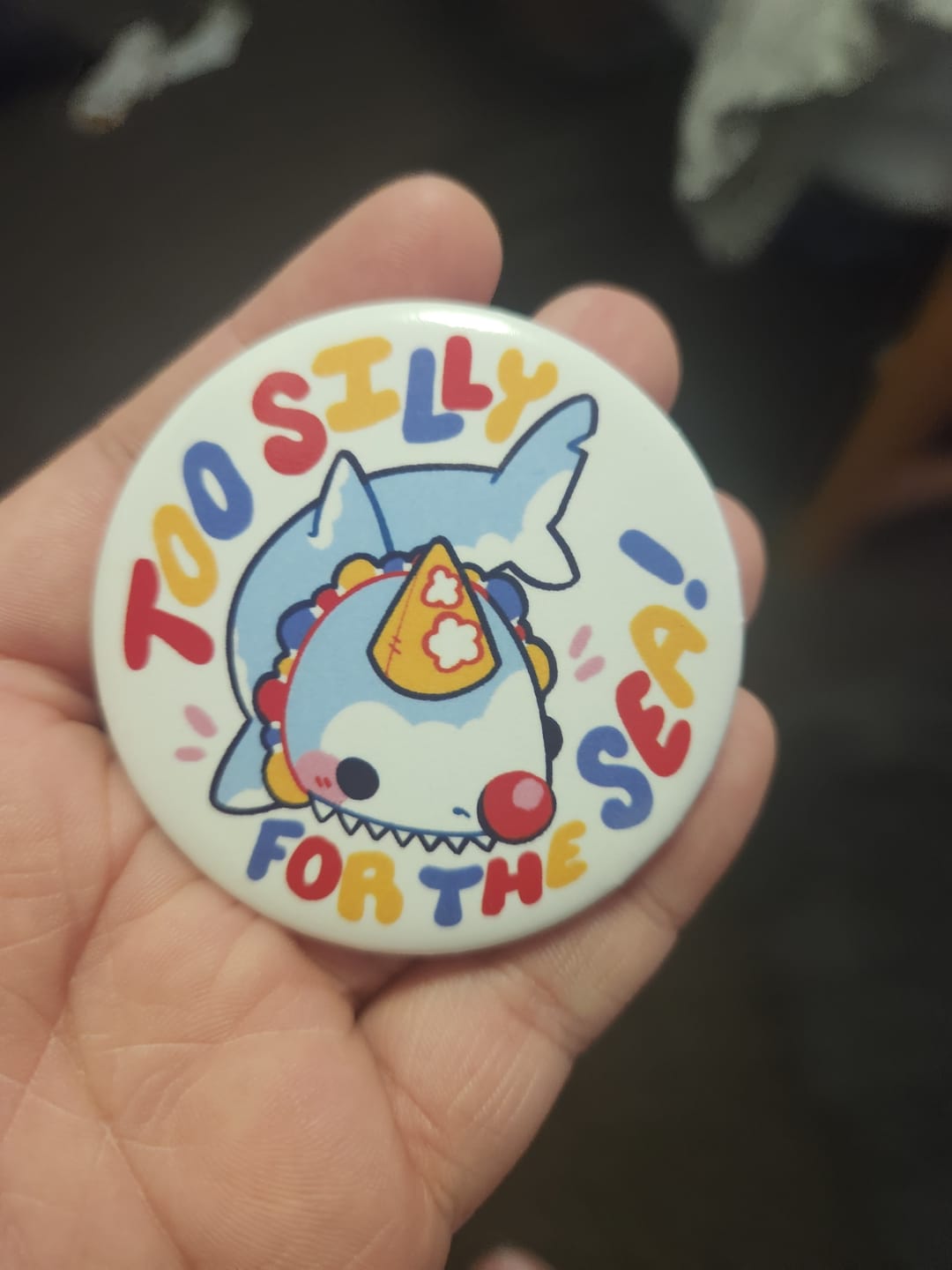 Customer photo review of Too Silly for the Sea Clown Shark Button