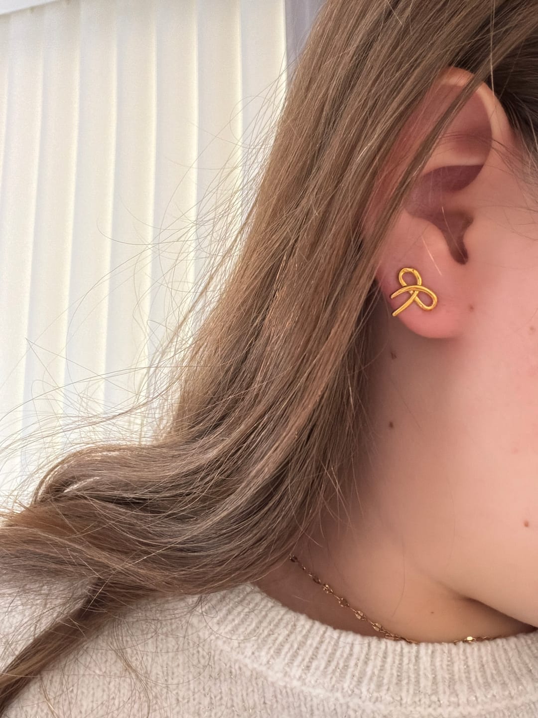 Customer photo review of Alice Clip On Earrings in Gold
