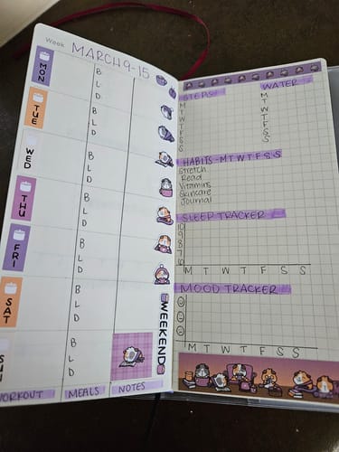 Reviewer's weekly planner decorated with the cute Staying Cozy sticker kit, showing a purple layout with guinea pig characters.