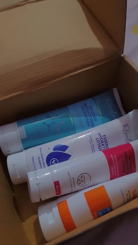Customer's 24 Hour Glow Pack, showing the four skincare tubes arranged inside a cardboard box.