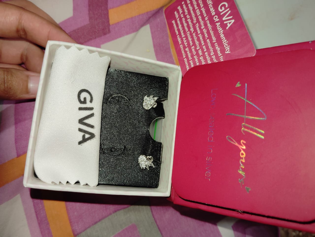 Customer photo review of Manali's Shining Swan Studs