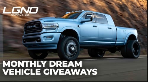 Customer's promotional image for the vehicle giveaway, showing a custom light-blue truck driving on a road.