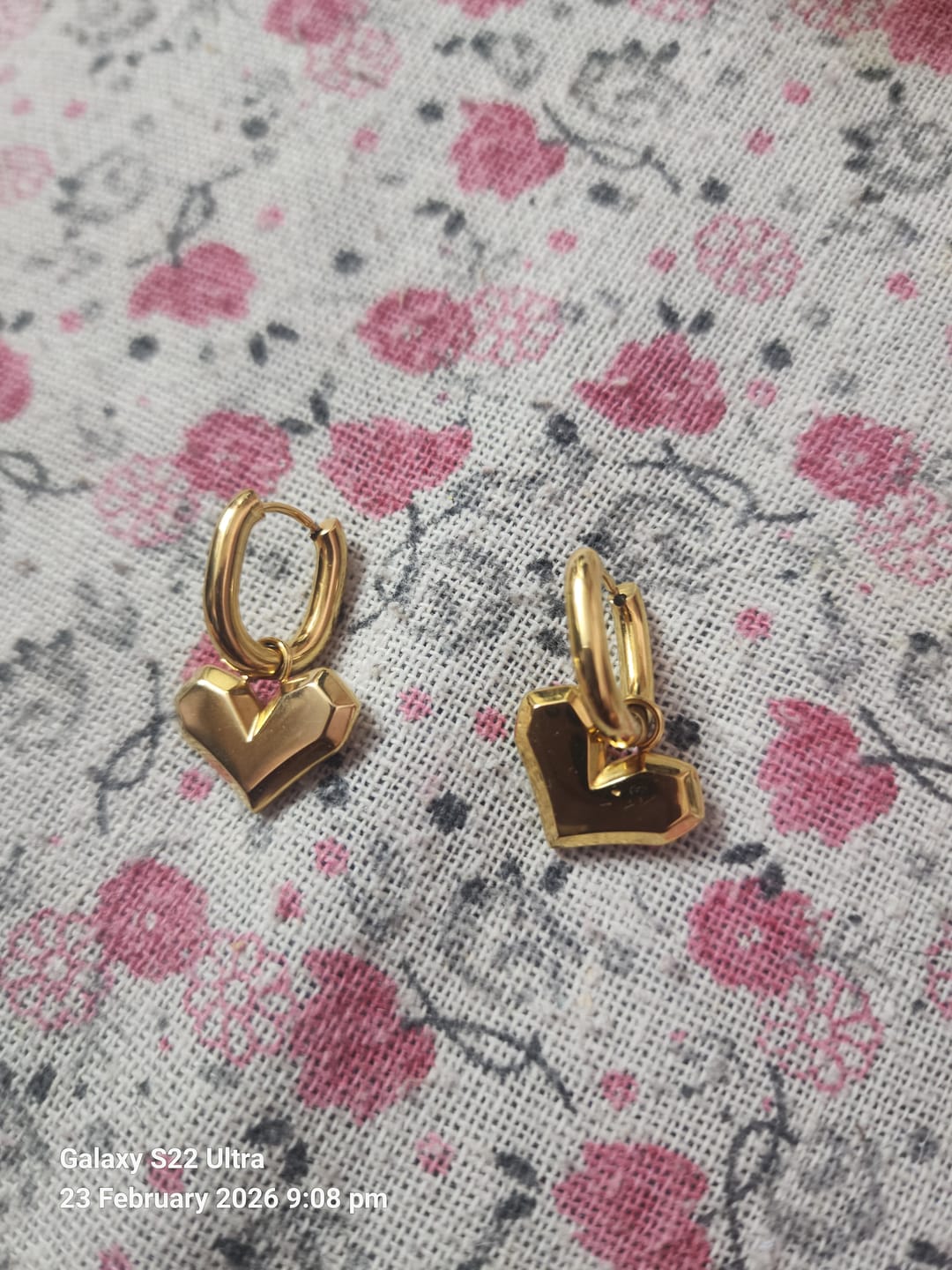Customer photo review of Peripheral Heart Earrings