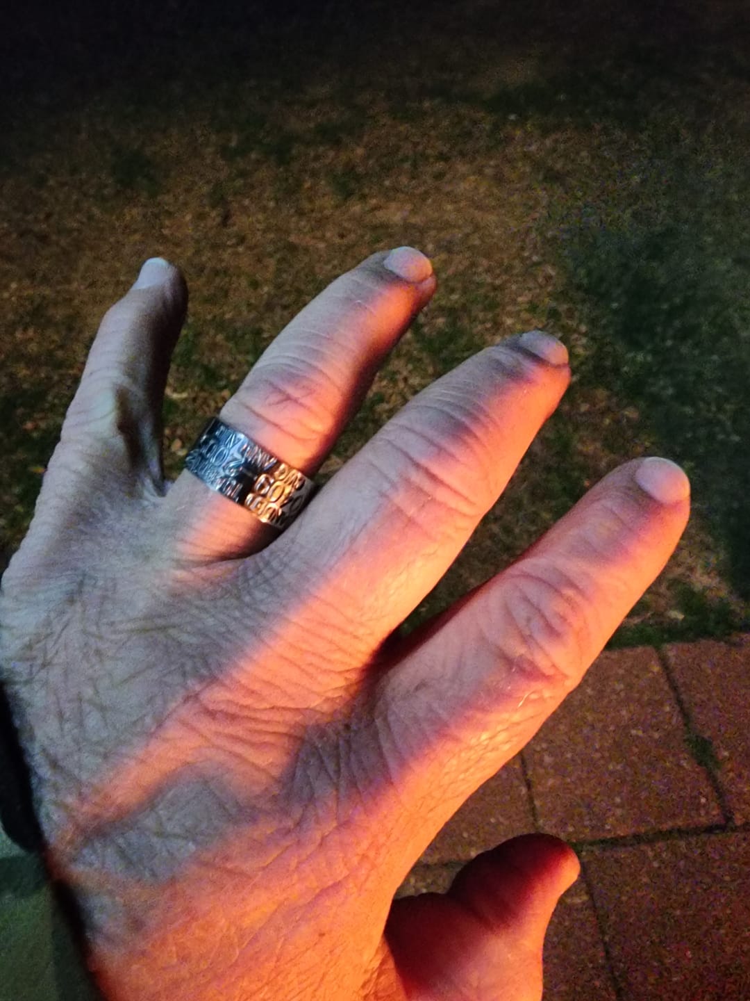 Customer photo review of Duck Band Wedding Ring - 10mm Titanium