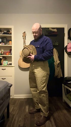Reviewer standing indoors showing the full-length, classic fit of the 1942 US Army Chino Trousers.