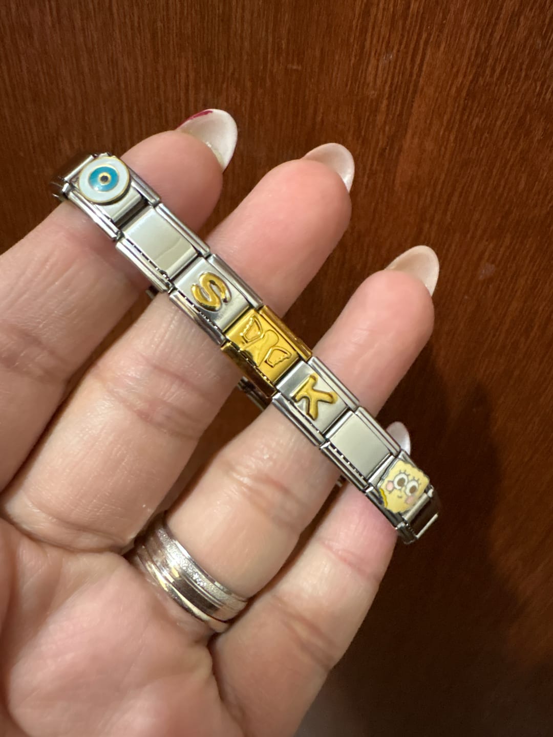 Customer photo review of Charm Inicial Dorada
