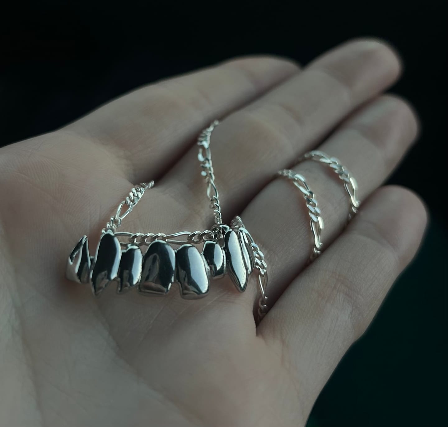 Customer photo review of 2.3MM STERLING SILVER FIGARO CHAIN