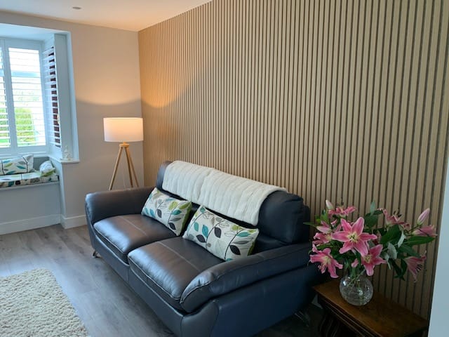 Customer photo review of Wooden Wall Panel | Natural Oak Grey Felt | Premium 3-sided Wood Veneer