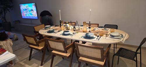 Customer's Amber Carafe & Tumbler set displayed on a fully set dining table at home.
