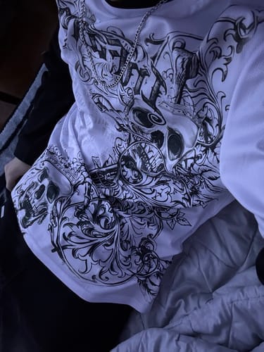 Customer photo review of 'INFAMOUS' TEE