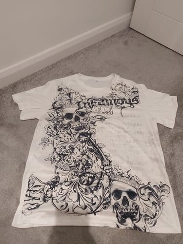 Customer photo review of 'INFAMOUS' TEE
