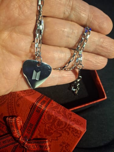 Customer photo review of SUGA Guitar Pick Necklace