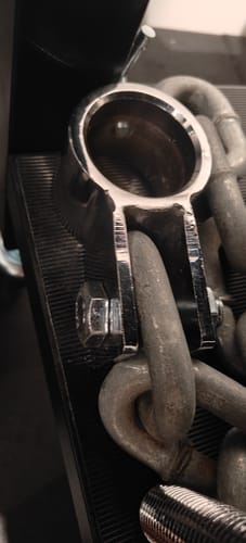 Customer's close-up of a shiny Olympic Chain Collar attached to a heavy-duty metal chain.