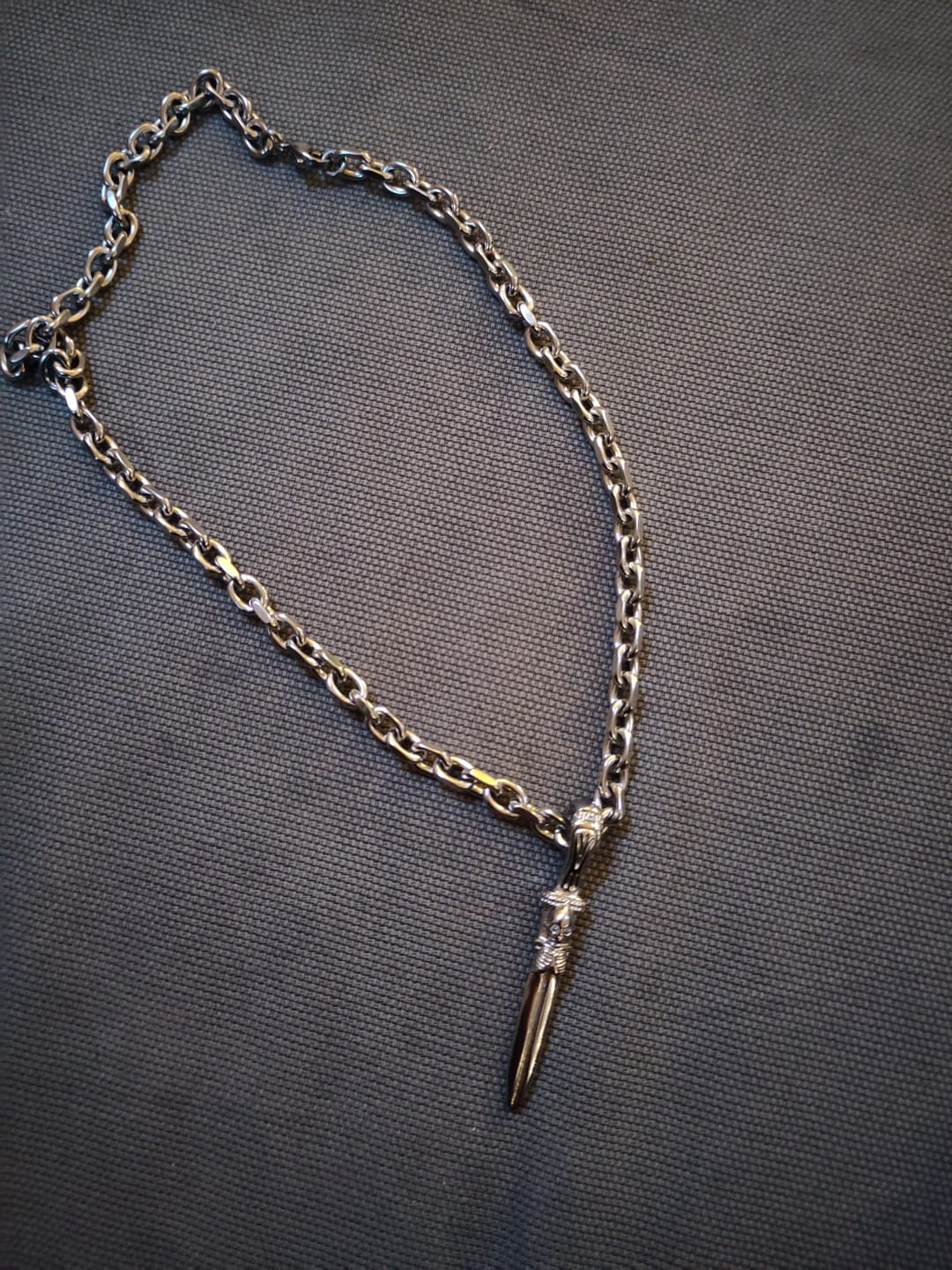 Customer photo review of CATACOMB SWORD PENDANT