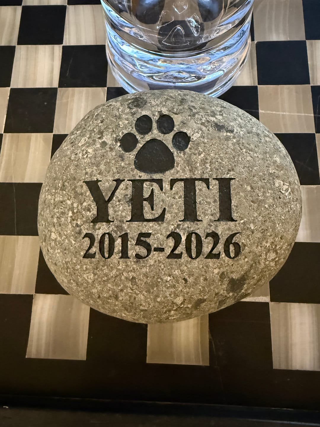 Customer photo review of Dog headstones Grave Marker Custom Engraved Pet Memorial River Rock Stone Heart Paw Print