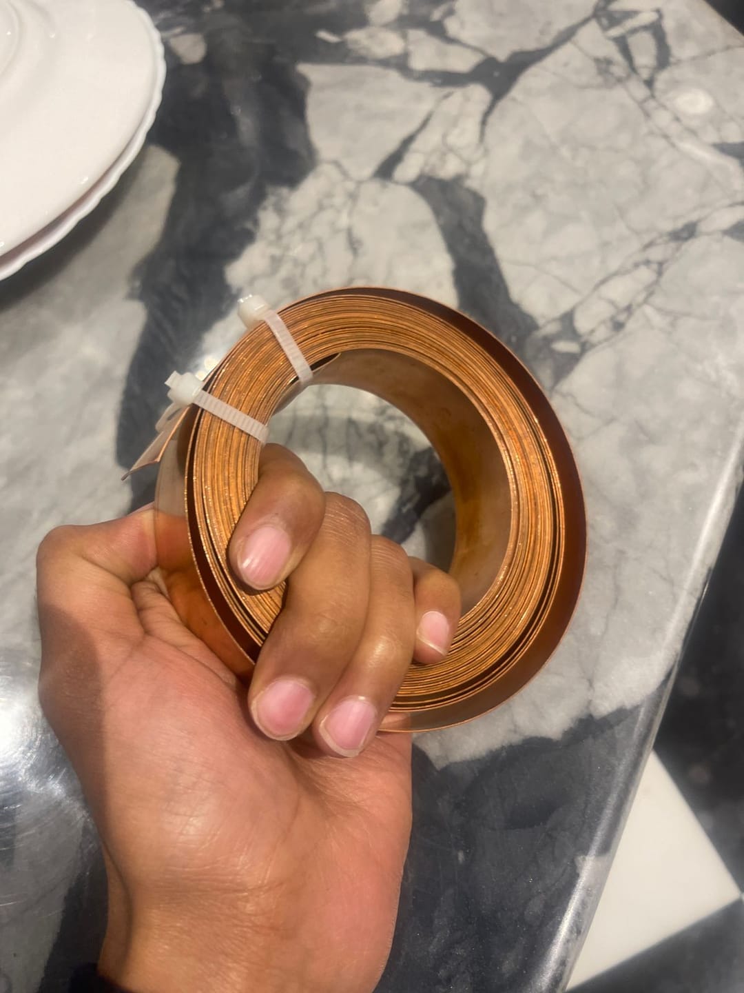 Customer photo review of Premium 100% Pure Copper Vastu Remedy Strip 1 mm Thickness for Cut, Extension, Toilet and Door Corrections – High-Conductivity Metal Vastu Tool by Vastu Mandir