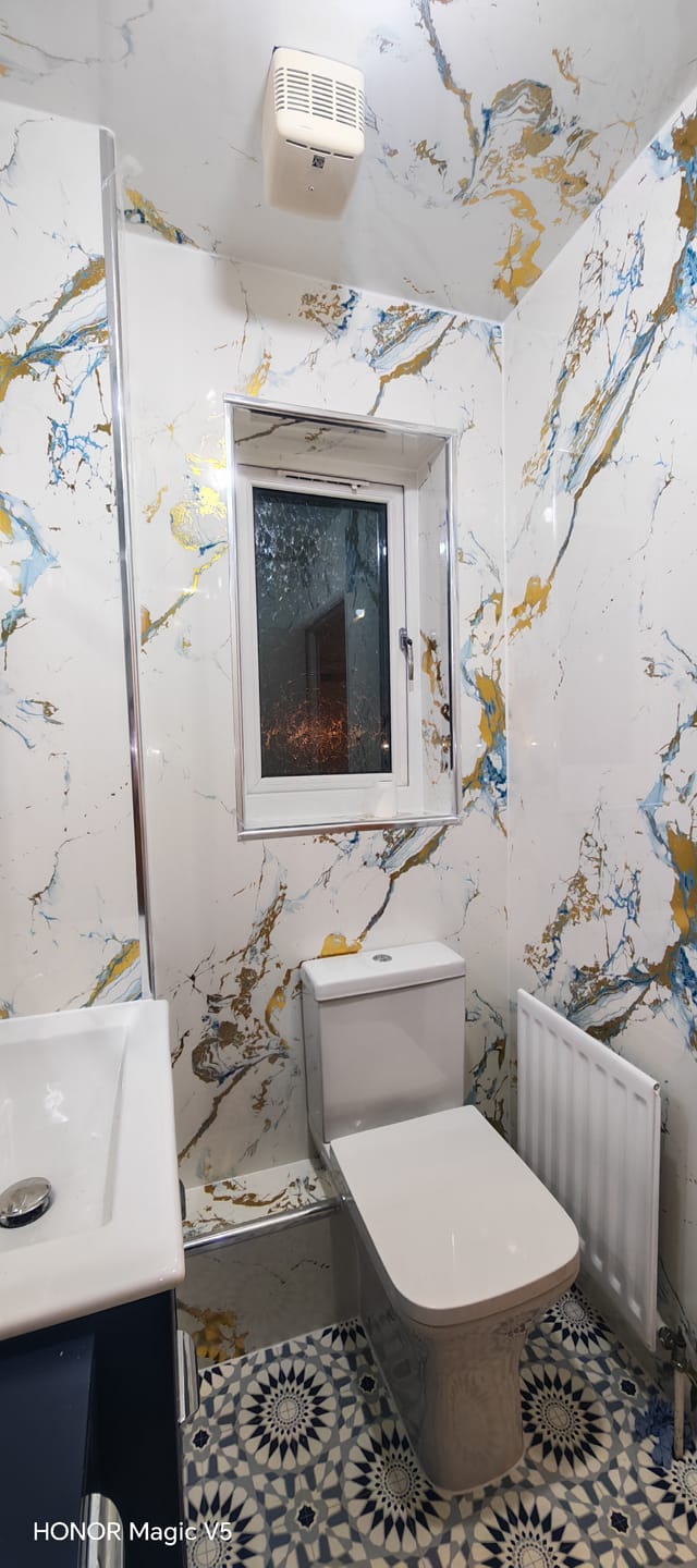 Customer photo review of 10mm Oro Blue Gloss Shower Panel 1M x 2.4M