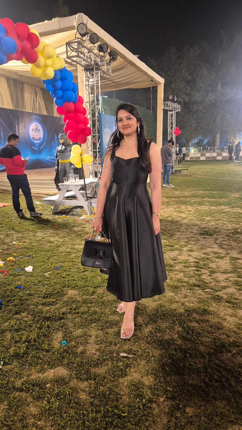Customer photo review of Rigata Holiday Statement Maxi Dress in Black