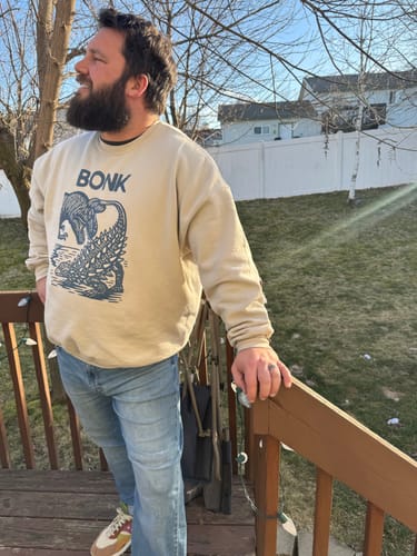 Customer wearing their Thorum Replacement ring while standing on an outdoor deck.