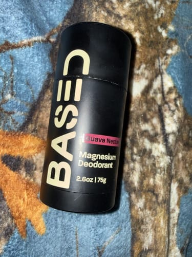 Customer's black tube of BASED Magnesium Deodorant in the Guava Nectar scent.