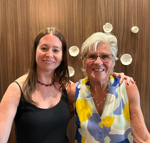 A smiling reviewer shows their short, gray hair after using the Seaside Luxe Shampoo Bar.