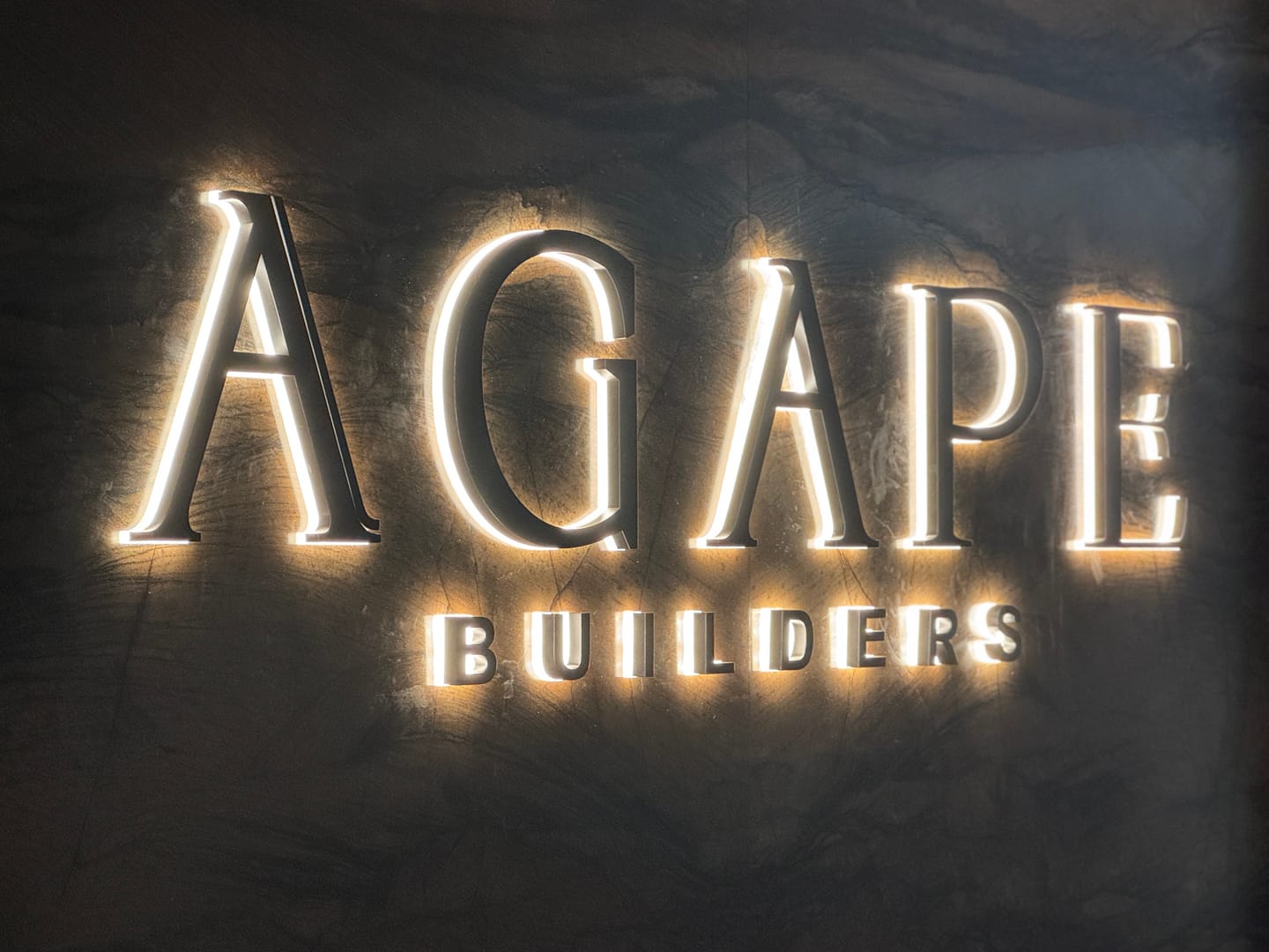 Customer photo review of Custom Metal Backlit Sign For Agape Builders