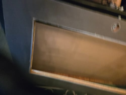 Close-up: Blurry view of the door opening before installing the new Full Lite Frame Kit.