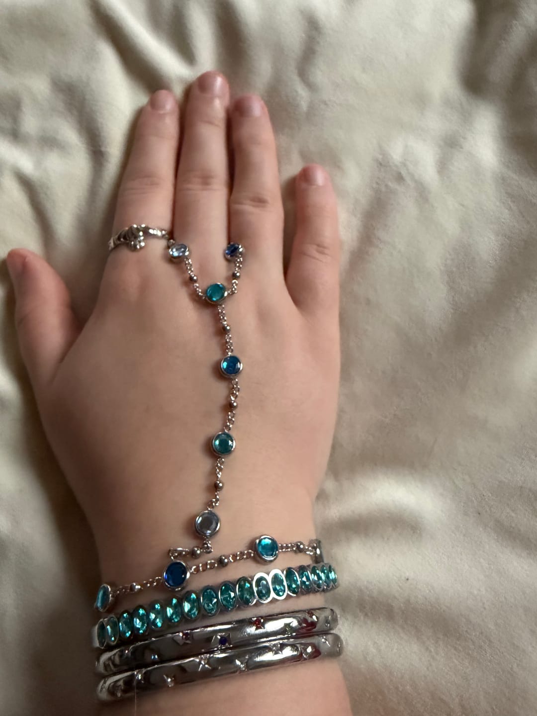 Customer photo review of Tshenolo Multi-Tone Hand Chain Blue & Silver