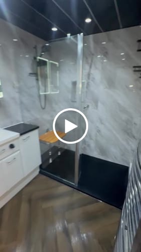 Customer video review of Premium Grey Stone Marble Gloss Shower Wall Panel - 1M x 2.4M