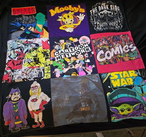Customer's colorful Premium T Shirt Quilt made from various pop culture t-shirts including Batman, Star Wars, and Mooby's.