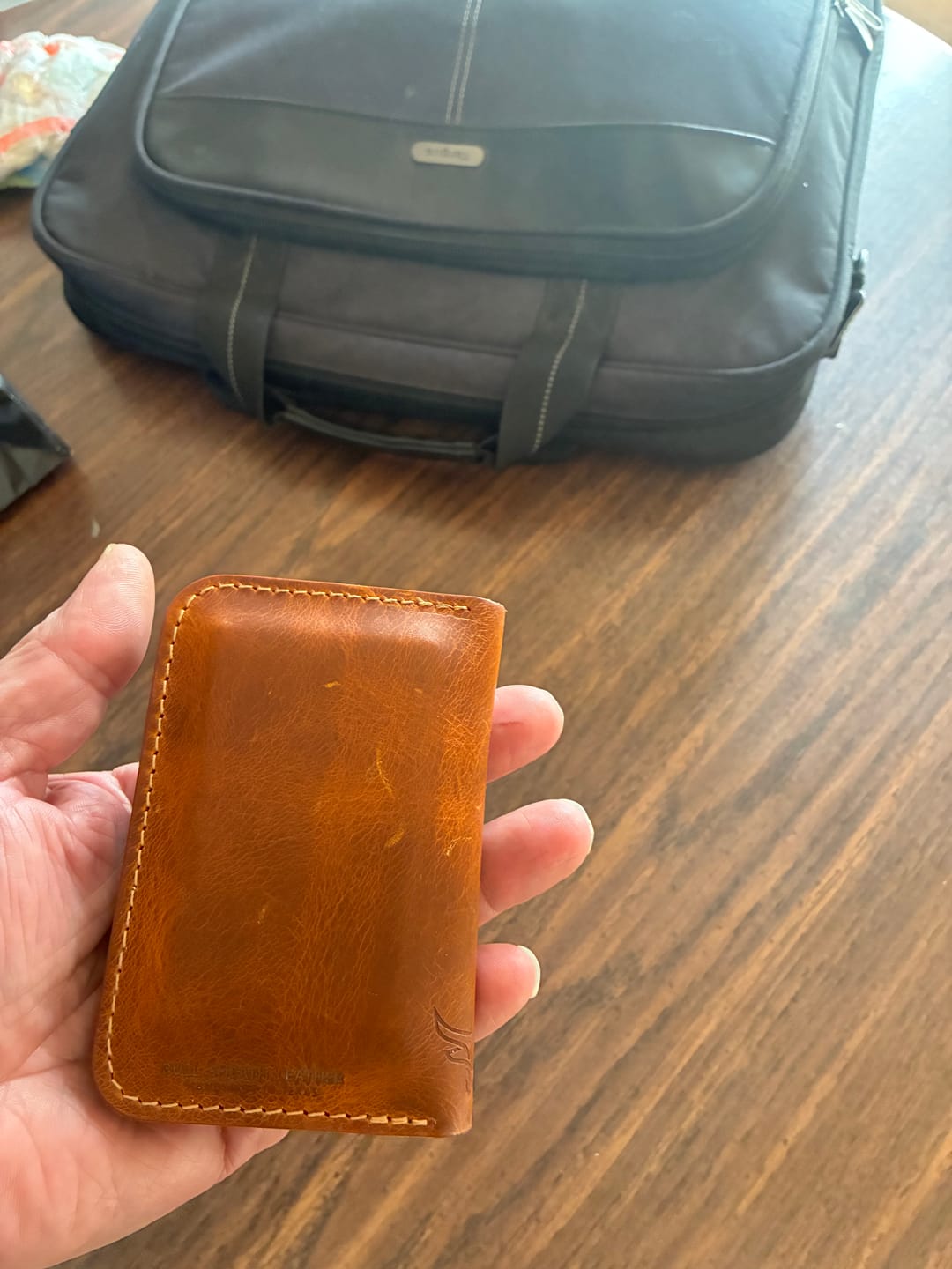 Customer photo review of The Tyler Vertical Wallet