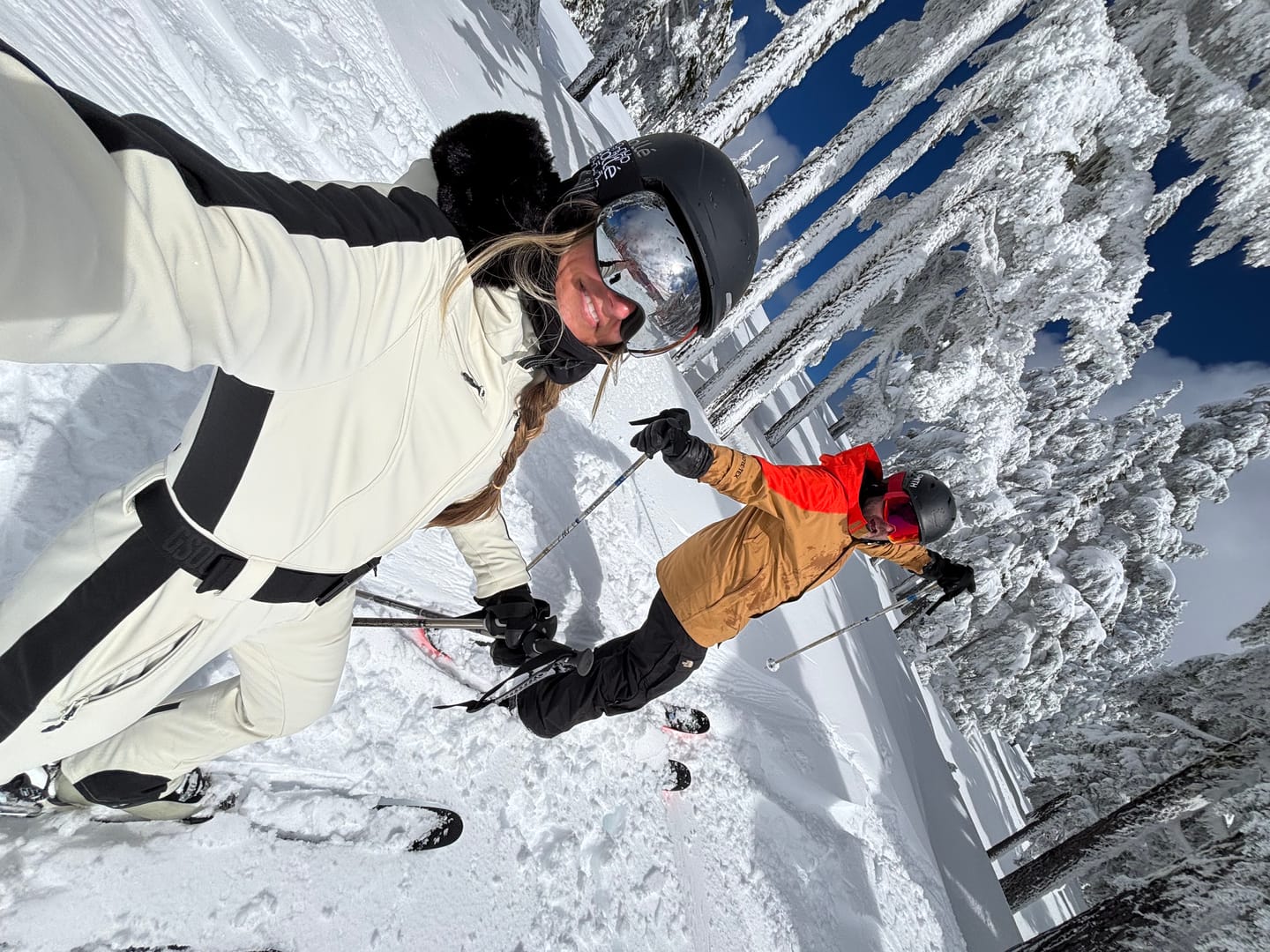 Customer photo review of Women's Slim-Fit Stretch Faux Fur Off White One-Piece Ski Suit
