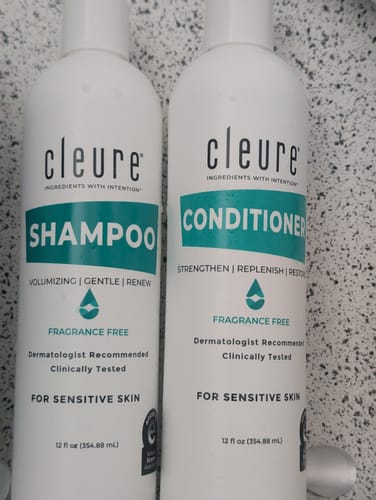 Customer's close-up of the Shampoo and Conditioner Duo, showing the fragrance-free and sensitive skin labels.