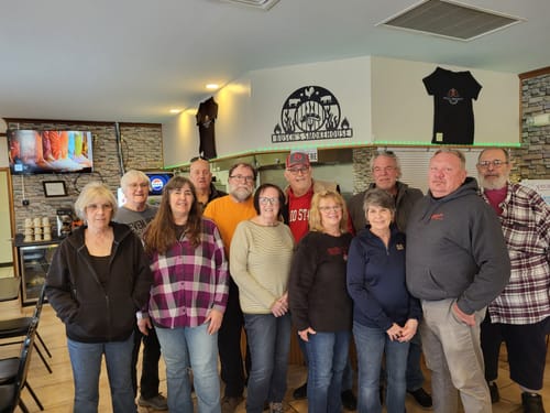 Reviewer's group photo submitted with their review for the Marled Thin Striped Sweater.