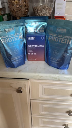 Customer's box of Sunna Electrolytes on a kitchen counter with other Sunna brand products.