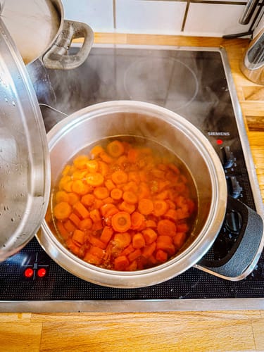 Customer photo of carrots simmering in a pot, showcasing the warm tone of the Food Lovers presets.