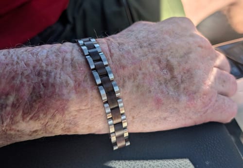 Customer wearing the sturdy Bowie Frontiersman Bracelet on their wrist.