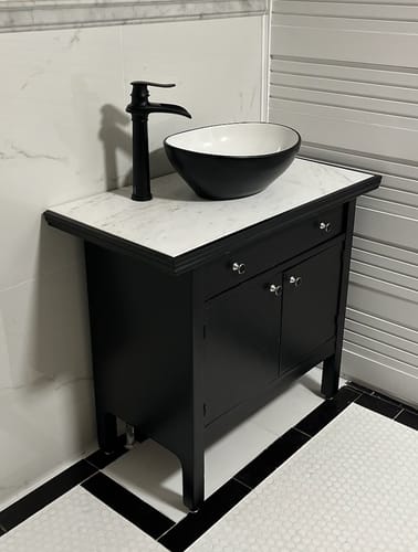 Customer photo review of Waterfall Bathroom Sink Faucet With Pop-up Drain Matte Black