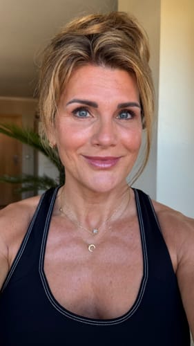 Reviewer showing her smooth, refreshed skin after using the Skin Refining Duo.