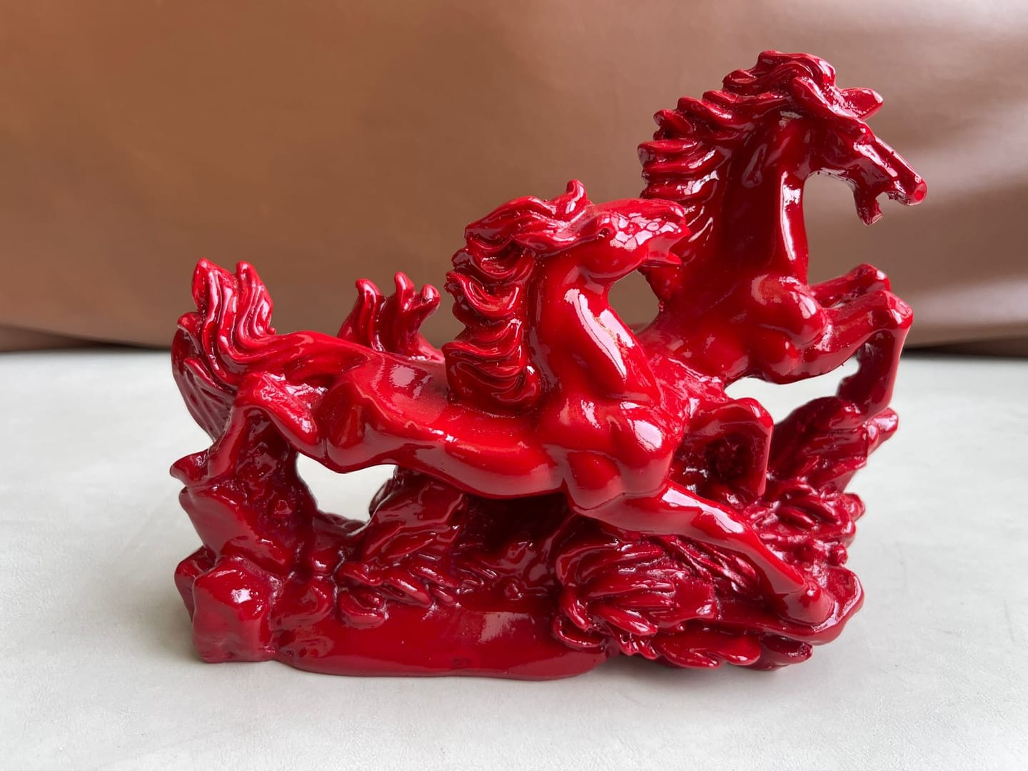 Customer photo review of Two Red Running Horses Statue in Premium Quality Decorative Showpiece Resin Article for Home and Office Decor by Vastu Mandir